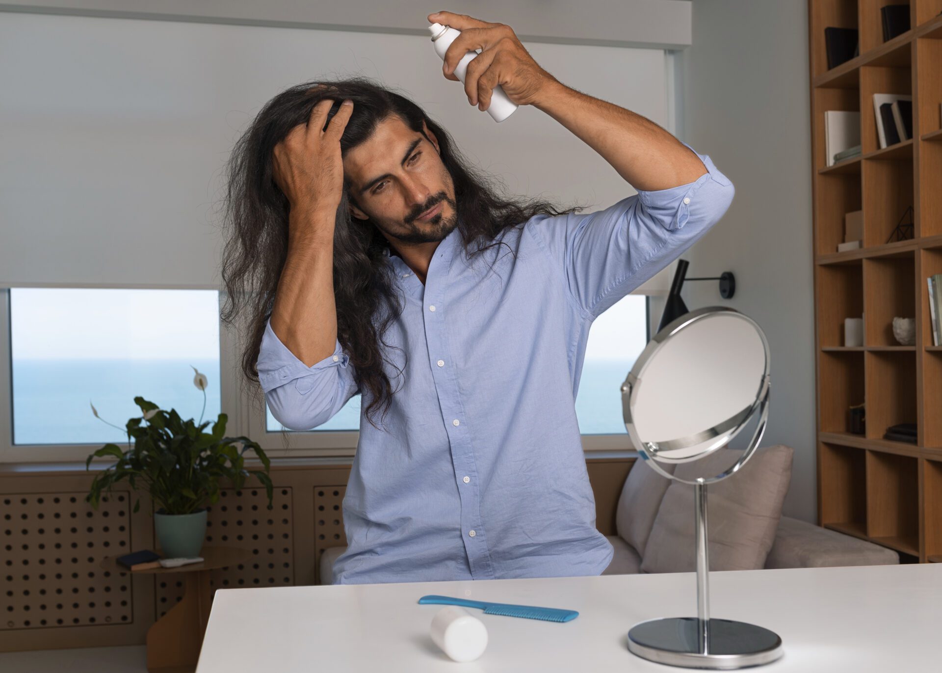medium-shot-man-using-dry-shampoo-home